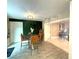 Entertainment room with mounted TV, game table, and accent wall at 17933 Eagle Ln, Lutz, FL 33558