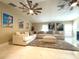 Spacious living area boasting neutral tones, stylish decor, and ample natural light at 17933 Eagle Ln, Lutz, FL 33558