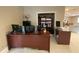 Well-lit office space equipped with multiple monitors and a spacious desk setup at 17933 Eagle Ln, Lutz, FL 33558