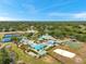 Captured from above, this community features swimming pools, tennis courts, and manicured landscaping, promoting resort-style living at 19156 Dove Creek Dr, Tampa, FL 33647