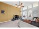 Spacious living room featuring tile floors, archways, high ceilings, and comfortable seating at 19156 Dove Creek Dr, Tampa, FL 33647