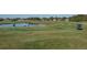 An idyllic golf course offers manicured greens, a scenic pond, and a pleasant place to play at 2014 Hampstead Cir, Sun City Center, FL 33573