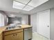 Bright kitchen flowing into the living area with an open floorplan at 2014 Hampstead Cir, Sun City Center, FL 33573