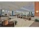 The lobby features elegant seating, plants, and stylish decor for a welcoming atmosphere at 2014 Hampstead Cir, Sun City Center, FL 33573