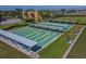 Community shuffleboard courts offer a fun way to socialize and enjoy the outdoors at 2014 Hampstead Cir, Sun City Center, FL 33573