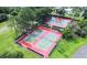 Overhead view of the community tennis courts featuring beautiful landscaping at 2014 Hampstead Cir, Sun City Center, FL 33573