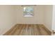 Well-lit bedroom with modern flooring and a large window at 213 Red Cedar Pl # 213, Brandon, FL 33510