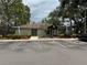 Community clubhouse with well-manicured landscaping and ample parking at 213 Red Cedar Pl # 213, Brandon, FL 33510
