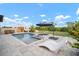 Beautiful pool with spa and backyard sauna offering a luxurious outdoor experience at 21648 Snowy Orchid Ter, Land O Lakes, FL 34637