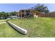 Attractive home featuring well-kept lawn and mature landscaping, offering great curb appeal at 2287 Demaret Dr, Dunedin, FL 34698