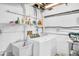 Functional laundry room features modern appliances and ample storage space for household needs at 2287 Demaret Dr, Dunedin, FL 34698