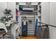 Organized closet with shelving, a shoe rack, and hanging storage offers ample space for clothing and accessories at 2412 Hammock Pine Blvd, Clearwater, FL 33761