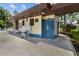 An outdoor shower for rinsing off with pool capacity and spa capacity sign at 2412 Hammock Pine Blvd, Clearwater, FL 33761