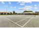 Outdoor tennis court available for residents to use on a sunny day at 2412 Hammock Pine Blvd, Clearwater, FL 33761