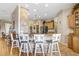 Kitchen view with granite countertops, breakfast bar, and stainless steel appliances at 2502 Fritzke Rd, Dover, FL 33527