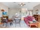 Cozy living room featuring hardwood floors, neutral tones, and comfortable furnishings at 2502 Fritzke Rd, Dover, FL 33527
