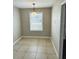Dining room with tile floor and natural light at 2557 Cedar Cypress Ct, Tampa, FL 33618