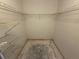 Empty closet space with wire shelving, ready for customization and storage solutions at 2621 Cove Cay Dr # 206, Clearwater, FL 33760