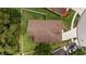A top-down perspective highlights a home with a private yard and convenient driveway access at 26749 Middleground Loop, Wesley Chapel, FL 33544