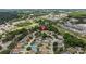 An expansive aerial view of the neighborhood, showcasing the home's location near a greenbelt, lakes, and community amenities at 26749 Middleground Loop, Wesley Chapel, FL 33544
