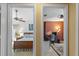 Dual doorway showcasing a bedroom and office space at 26749 Middleground Loop, Wesley Chapel, FL 33544