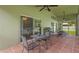 Outdoor porch features tile floors and ceiling fans for comfortable outdoor living at 26749 Middleground Loop, Wesley Chapel, FL 33544