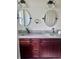 Bathroom with double vessel sinks, granite countertops, and a modern vanity at 2841 S Cranberry Blvd, North Port, FL 34286