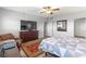 Bedroom with ample space, including a queen-size bed, large dresser, and a well-lit study area at 30 Turner St # 704, Clearwater, FL 33756
