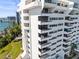 Stunning view of this modern white condo building with multiple balconies overlooking the waterfront at 30 Turner St # 704, Clearwater, FL 33756