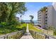 Lush landscaped grounds lead to a charming gazebo by the waterfront, enhancing the property's appeal at 30 Turner St # 704, Clearwater, FL 33756