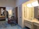 Bright bathroom with dual vanities and ample counter space at 3200 Sandy Ridge Dr, Clearwater, FL 33761