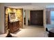 Welcoming foyer featuring stone accent wall, tiled flooring, and a glimpse of an open floor plan at 3200 Sandy Ridge Dr, Clearwater, FL 33761