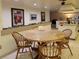 Spacious kitchen features a large dining area and a decorative planter box behind the table at 3200 Sandy Ridge Dr, Clearwater, FL 33761