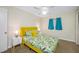 Bright bedroom features closet, cheerful decor, and great natural light at 3749 Mckay Creek Dr, Largo, FL 33770