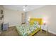 Bright bedroom features closet, cheerful decor, and great natural light at 3749 Mckay Creek Dr, Largo, FL 33770