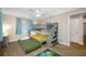 Colorful bedroom featuring a bunk bed with a trundle and ample storage at 3749 Mckay Creek Dr, Largo, FL 33770