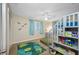 Kid-friendly bedroom featuring a bunk bed, bright carpet, and decorative accents at 3749 Mckay Creek Dr, Largo, FL 33770