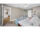 Large main bedroom with closet and connected view into other living spaces of the home at 3749 Mckay Creek Dr, Largo, FL 33770