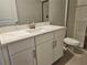 Bright bathroom with marble counters, vanity, faucet, and glass shower door at 3776 Maxwell Park Dr, Sun City Center, FL 33573