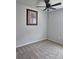 Bedroom featuring neutral walls, carpet, a ceiling fan with light fixture, and framed art at 3776 Maxwell Park Dr, Sun City Center, FL 33573