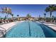 Large community pool perfect for swimming laps and relaxing in the sun at 3776 Maxwell Park Dr, Sun City Center, FL 33573