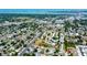 An aerial view showing the proximity to the bay with residential streets and mature trees at 3951 72Nd N St, St Petersburg, FL 33709