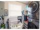 Functional laundry room with washer, dryer and ample storage space at 3951 72Nd N St, St Petersburg, FL 33709