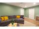 Cozy living room featuring hardwood floors, a comfortable couch, and stylish decor at 3951 72Nd N St, St Petersburg, FL 33709
