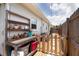 Side yard with potted plants, a wooden fence, and a workbench area, offering a functional and appealing outdoor space at 3951 72Nd N St, St Petersburg, FL 33709