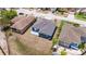 Home's backyard featuring a covered patio with a grey roof at 4555 Hannah Ln, St Petersburg, FL 33709