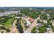 A picturesque aerial shot of a home near a winding river, highlighting lush greenery, and a bridge at 4555 Hannah Ln, St Petersburg, FL 33709