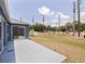 Open backyard featuring a sliding door to the home's interior and views of the surrounding area at 4555 Hannah Ln, St Petersburg, FL 33709