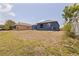 Expansive backyard providing plenty of space for outdoor activities and potential landscaping at 4555 Hannah Ln, St Petersburg, FL 33709