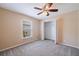 Neutral bedroom with carpet, closet, ceiling fan and natural light at 4555 Hannah Ln, St Petersburg, FL 33709